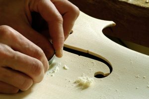 12-Scraping the inside of the instrument-nicolas-gilles-violin-maker-montpellier-villeneuvette-france